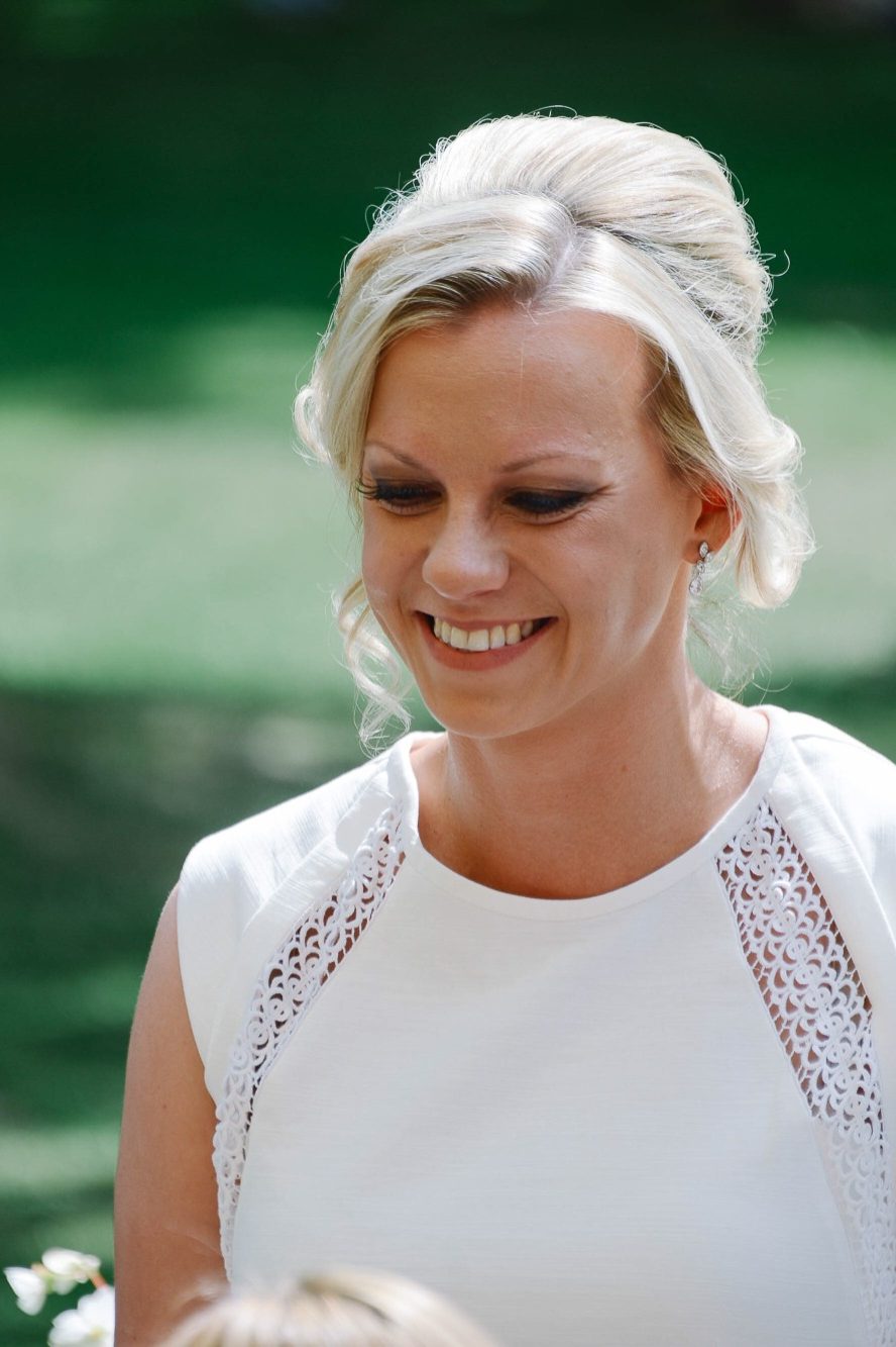 A happy, smiling bride on her wedding with natural make-up. One of my Chester Zoo brides on her wedding day.